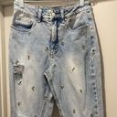 Tinseltown Distressed Light Denim Mom Jeans With Small Embroidered Sunflowers Photo 0