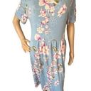 The Moon DB Floral Pattern Short Sleeve Flowy A-Line Dress With Pockets Photo 0