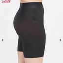 Spanx  Thinstincts 2.0 High-Waisted Mid-Thigh Short in Black Medium Photo 4