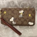 Coach  X Peanuts Long Zip Around Wallet In Signature Canvas Snoopy Woodstock Photo 8