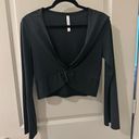 Fabletics  sleek knit twist front top - black - size medium Photo 1