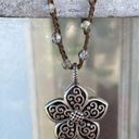 Brighton  Silver Toned Flower Reversible Pendant on a Brown Braided Cord. EUC! Photo 4