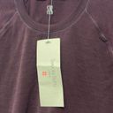 Sweaty Betty  athletic seem less workout short sleeve maroon t shirt. Size large Photo 1