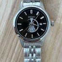Seiko  Ladies Watch Black Dial with Train motif Stainless Bracelet and hands Photo 0