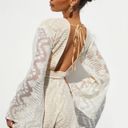 Pretty Little Thing  Nude Lace Flare Sleeve Romper Photo 1