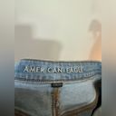 American Eagle Pre-Owned Size 14  Light Blue Heavily Distressed Mom Jeans Photo 7