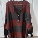 Free People cute oversized  sweater! Shorter in the front and long in the back! Photo 0