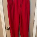 Russell Athletic Russell women’s vintage red lined nylon track pants w/pocket zip ankles. Size L Photo 0