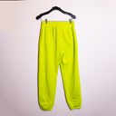 Nike Women's Sportswear Club Fleece Mid-Rise Oversized Sweatpants Lime Green S Photo 4