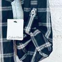 Calvin Klein women's long sleeve button down shirt, black check, adjustable sleeves, size S Photo 4