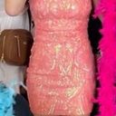 Windsor I’m selling a peachy dress. It’s one shoulder it’s a size small from Photo 2