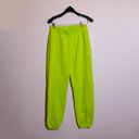 Nike Women's Sportswear Club Fleece Mid-Rise Oversized Sweatpants Lime Green S Photo 0