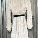 Hazel trench style coat. Cream furry material with black silky ribbon belt. Size L Photo 1