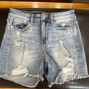 Judy Blue  paint slash distressed shorts in a size small Photo 9
