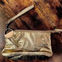 Chateau  | ladies metallic gold wristlet. Photo 0