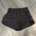 Athleta  High Rise Mesh Racer Run 3" Short in Black Size Medium Photo 1