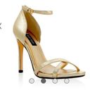 White House | Black Market  Gold High Heels Photo 0