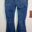 Risen elastic distressed vintage flare jeans Photo 1