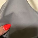 Fabletics  metallic gray padded woman sport bra size LARGE criss cross back Photo 5