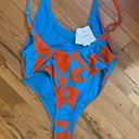 Fabletics  new blue and orange cheeky bathing suit size large Photo 2