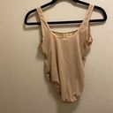 DKNY  Bodysuit Size Medium. Photo 1