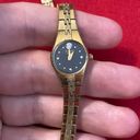 Bulova Woman’s gold plate stainless steel diamond dial  watch Photo 4