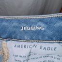 American Eagle  medium wash denim next level stretch mid rise jegging jean size 2 Photo 4