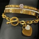 Spring Love Bangle Bracelet Stack W/Charm Bracelet Stainless Steel Gold NWOT Photo 0