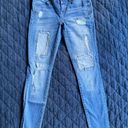 Bebe  Distressed Patched Blue Jeans Sz 27 Photo 0