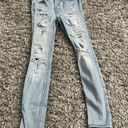 Hollister American Eagle High rise Super Skinny Distressed Jeans size 00S Photo 0