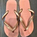 Havaianas  rose gold flip flops size 11/12 Photo 0