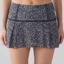 Lululemon  Lost In Pace Skirt (Regular) (13") Daisy Dust Alpine White Black Photo 0