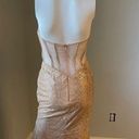 Cinderella Divine Women’s formal sparkly dress size 4
Brand is 
Rose gold color Photo 13