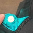 Lululemon sports bra sz 6 color is actually green Not sure why its showing blue. Photo 3