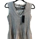 BCBGMAXAZRIA  NWT Haily peplum blouse. Zippered back, sleeveless, pleated bottom Photo 0