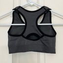 Black and Grey Stretchy Sports Bra in Size Small Photo 1