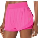 Sweaty Betty  Neon/ sonic pink athletic shorts.  Size small Photo 1