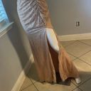 Cinderella Divine Women’s formal sparkly dress size 4
Brand is 
Rose gold color Photo 4