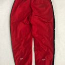 Nike Sportswear Windbreaker Pants Joggers Red Photo 1