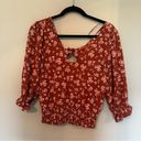 Nine Britton floral top with open back and adjustable bow Photo 0