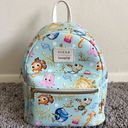 Lounge Fly  Disney Pixar Find Nemo Collage Mini Backpack in Light Blue Photo 0