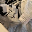 OVI all over print newspaper pants size L Photo 6