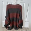 Free People cute oversized  sweater! Shorter in the front and long in the back! Photo 1