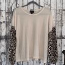 Discreet Cream waffle knit with cheetah sleeves top Photo 0