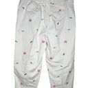 kim rogers  Cropped Pants Decorated with Flip Flops Photo 4