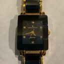 Christian Van Sant Sapphire Black & Gold Women’s Watch Photo 2