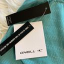 O'Neill  Shirt size XS brand new length 13” bust 30” teal color Photo 10