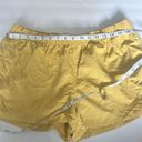 Patagonia  women’s yellow athletic drawstring shorts, size XL # Photo 6