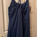 Halara sports dress with built in padded bra and spandex with pockets. Photo 1