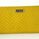 Cole Haan  Fold Over Wallet in Sunflower Yellow Snake Embossed Photo 0